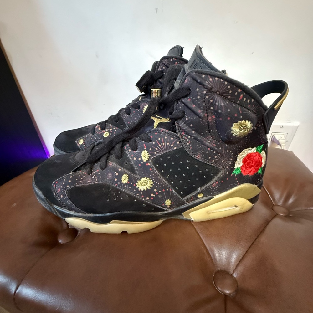Jordan Black and Gold Athletic Shoes